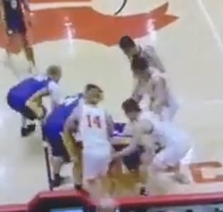 High School Basketball Player Punches Opponent After Game